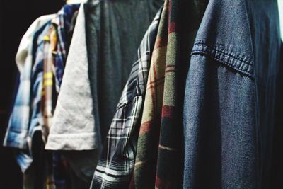 Close-up of clothes hanging on rack