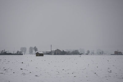 Buildings against clear sky during winter