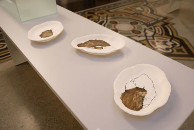 High angle view of chocolate cake in plate on table