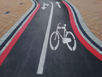 High angle view of bicycle sign on road