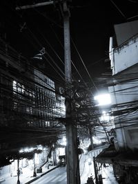 Low angle view of illuminated buildings at night