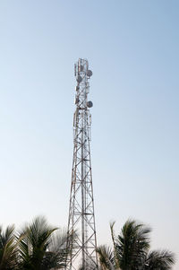 Low angle view of communications tower against sky