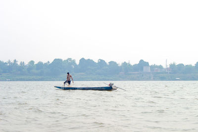 Boat sailing in river