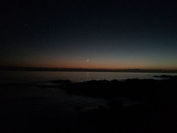 Scenic view of sea at night