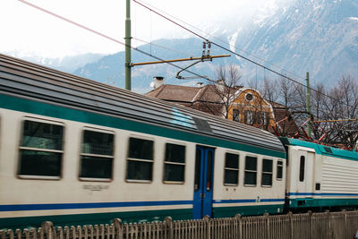 Train on railroad track against sky