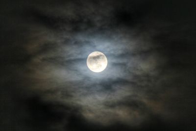 Low angle view of full moon in sky