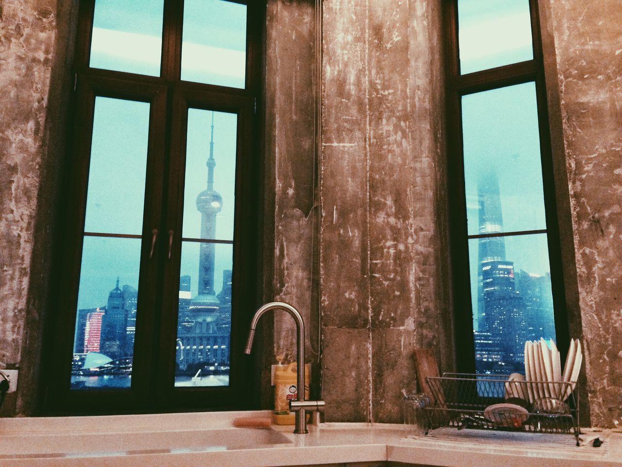architecture, built structure, building exterior, window, glass - material, building, indoors, city, day, architectural column, door, old, transparent, sunlight, history, entrance, reflection, sky, no people