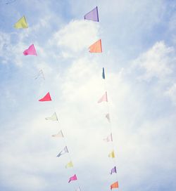 Low angle view of colorful bunting against sky