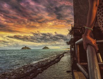 Scenic view of sea against cloudy sky