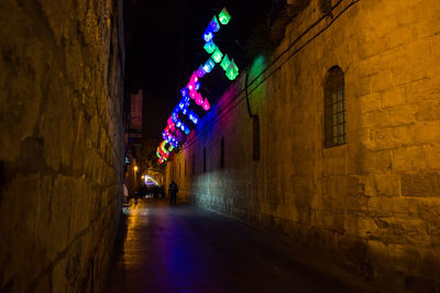 Illuminated buildings in city at night