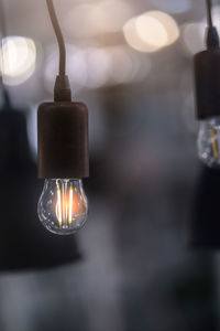 Close-up of illuminated light bulb