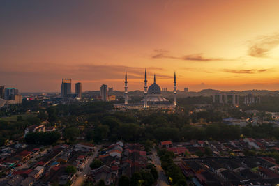 High angle view of cityscape against sky during sunset