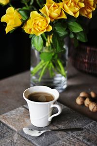 Close-up of coffee cup on table