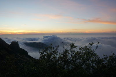 Scenic view of mountains against sky during sunset