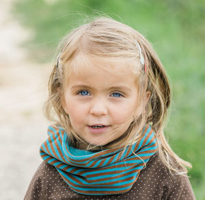 Portrait of cute girl outdoors