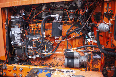 Internal combustion engine at the tractor. the inside of the engine mechanism in heavy equipment.