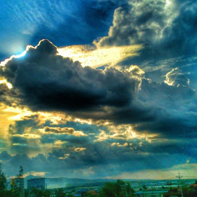 sky, cloud - sky, cloudy, sunset, beauty in nature, cloud, scenics, weather, dramatic sky, tranquil scene, cloudscape, tranquility, nature, storm cloud, overcast, atmospheric mood, moody sky, dusk, idyllic, blue