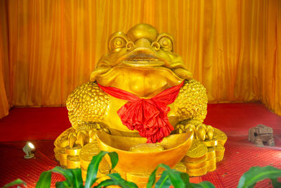 Close-up of buddha statue at temple