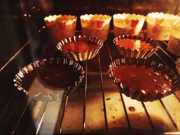 Close-up of illuminated lighting equipment on table