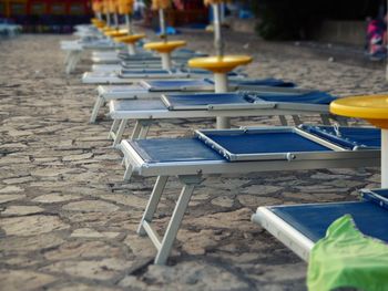 Empty chairs and tables at cafe