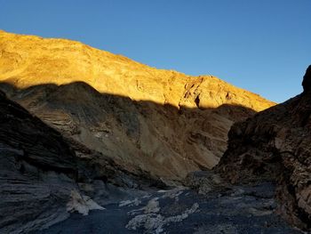 Scenic view of mountains against clear sky