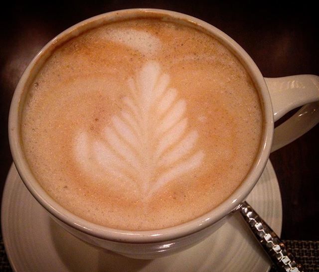 drink, coffee cup, food and drink, refreshment, coffee - drink, saucer, frothy drink, coffee, indoors, table, cappuccino, froth art, still life, freshness, cup, close-up, spoon, latte, high angle view, beverage