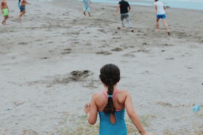 Boy playing on beach