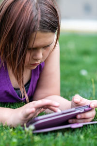 Child using electronic tablet 