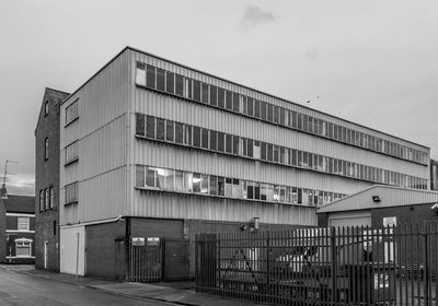 Low angle view of factory against sky