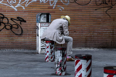 Man working on wall