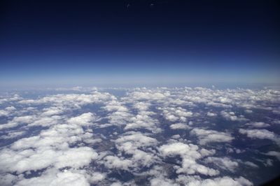 Aerial view of clouds against blue sky