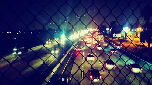 Chainlink fence at night