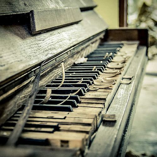 CLOSE-UP OF PIANO KEYS AT NIGHTCLUB