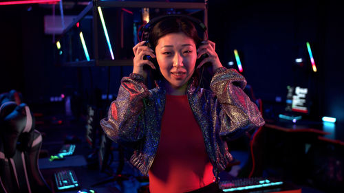 Portrait of woman at internet cafe