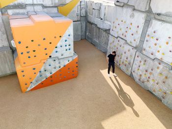 High angle view of man standing against built structure