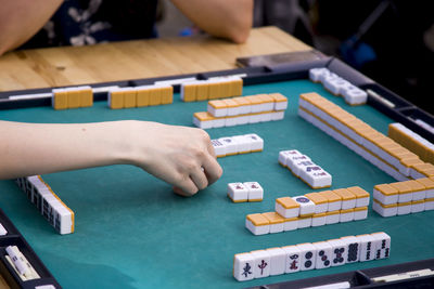 Close-up of women playing board game