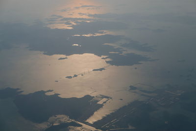 Aerial view of lake and cityscape