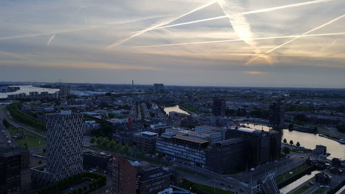 High angle view of buildings against sky during sunset