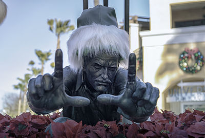 Close-up of statue against plants