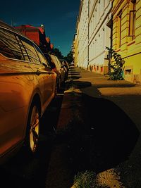 Car in city against sky