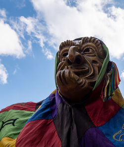 Low angle vie of statue against sky