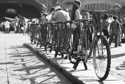 High angle view of bicycle and people on footpath