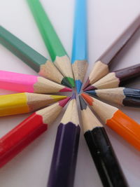 High angle view of colored pencils on table