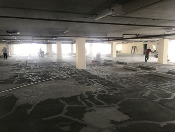 People standing in abandoned building