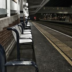 Illuminated railroad station at night