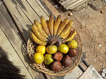 High angle view of apples in basket on table