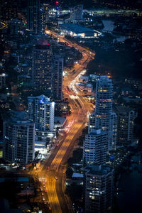 High angle view of illuminated city street at night