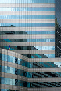 Low angle view of modern building against sky in city