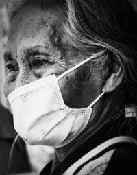 Close-up of woman wearing mask