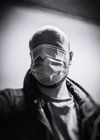 Portrait of man wearing mask
